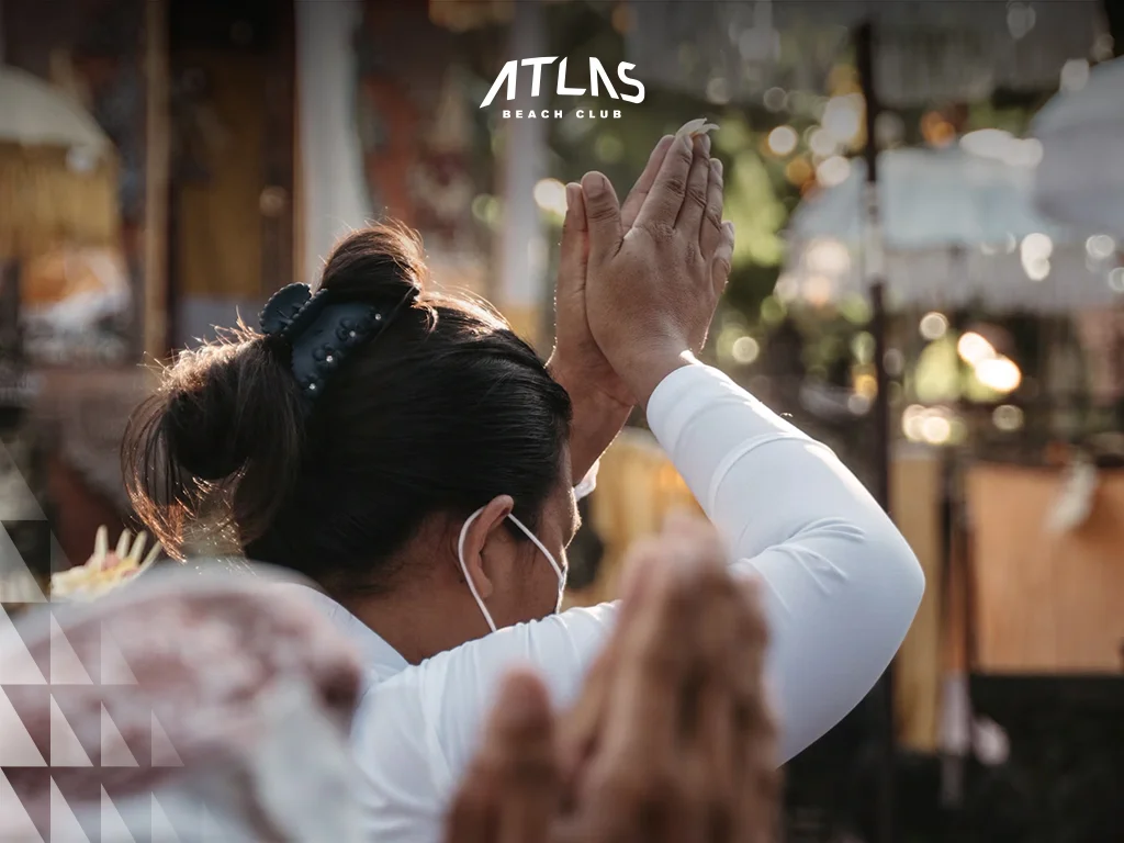 Tourists watching respectfully, cultural immersion in Bali, the traditional ceremony from a safe distance